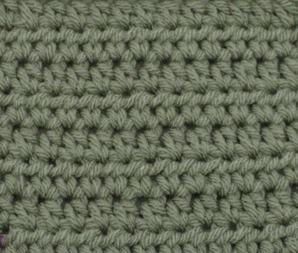 green swatch of half double crochet stitch