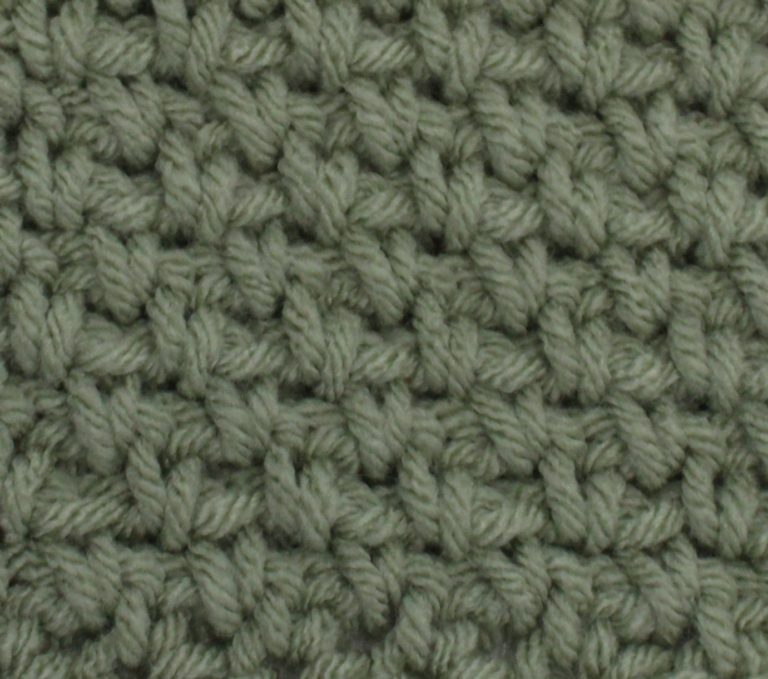 green crochet swatch of the moss stitch