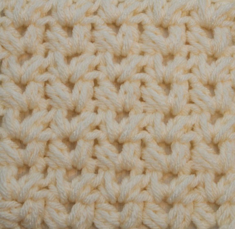 ivory crochet swatch showing the half double crochet cluster v-stitch