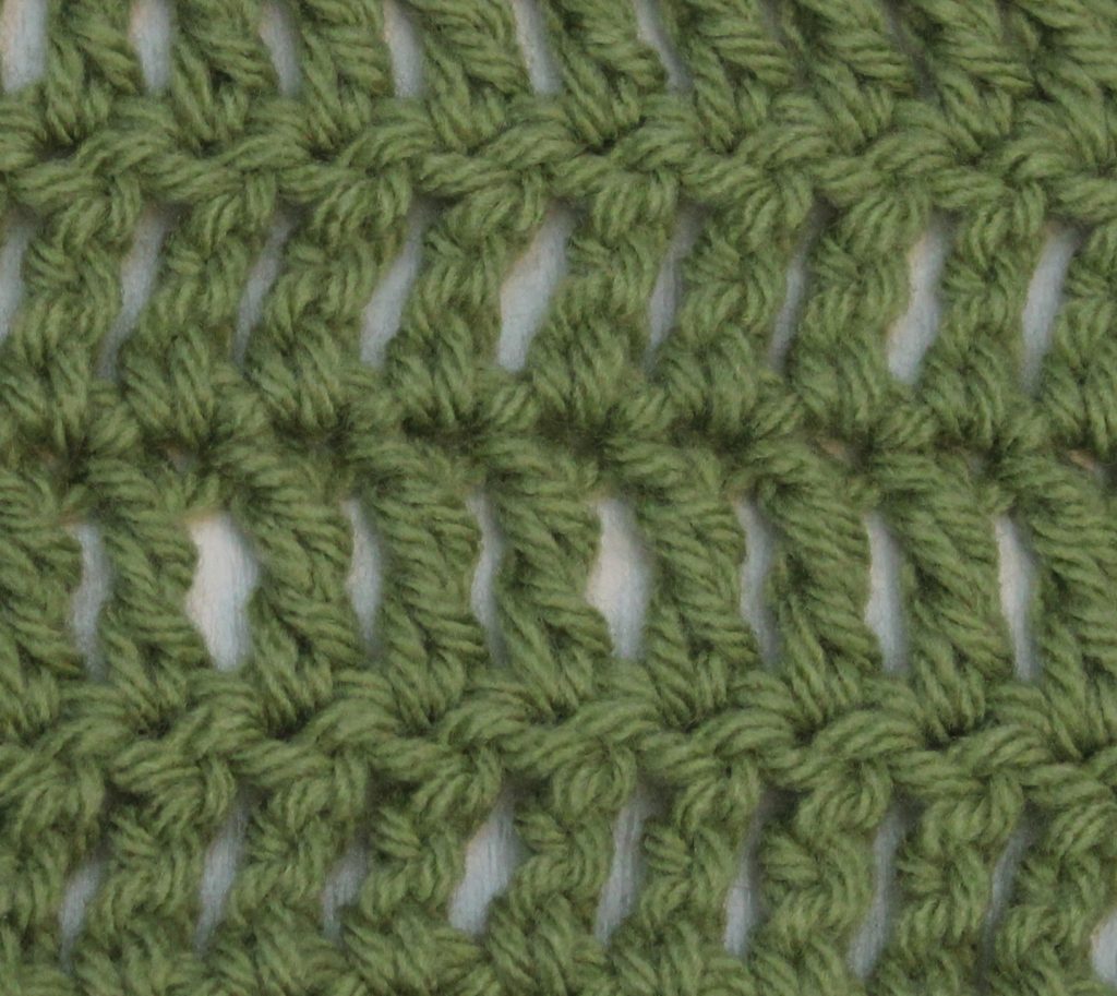 treble crochet stitch swatch in green yarn