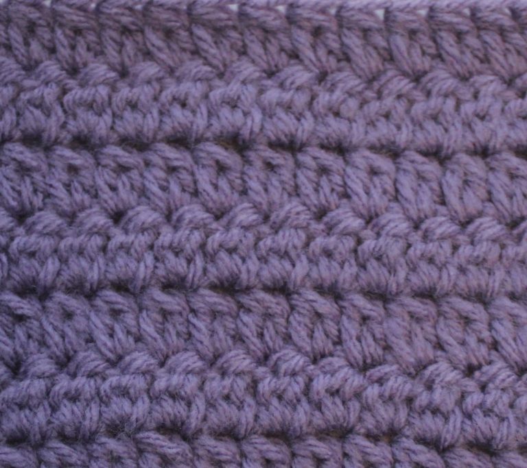 purple crochet swatch of the double crochet cluster stitch