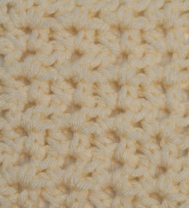 ivory crocheted swatch of the half double crochet v-stitch with a chain 1