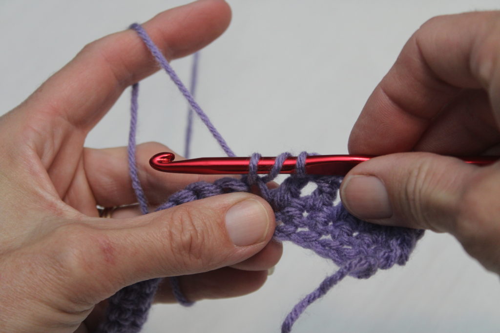 double crochet with 3 loops on hook