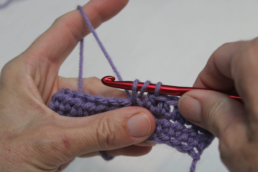 half double crochet stitch, 3 loops on the hook