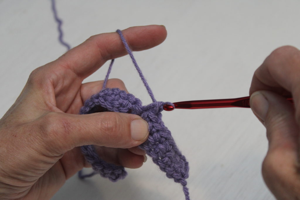 single crochet, last step pulling through 2 loops on hook
