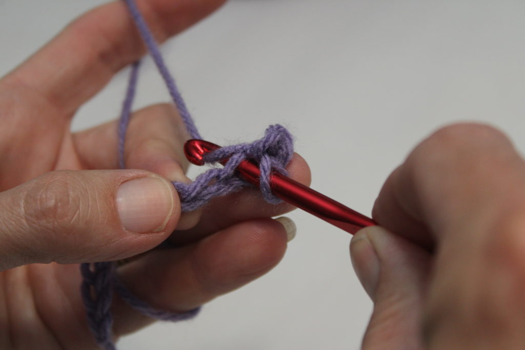 slip stitch, insert hook an yarn over