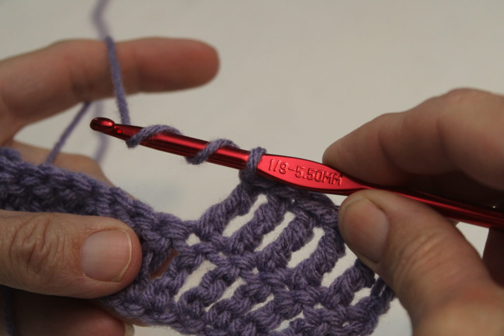 treble crochet step 1 yarning over twice