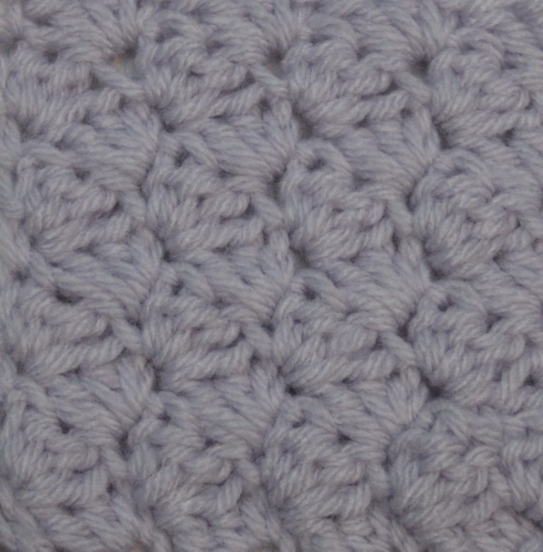 purple crochet swatch of the sedge stitch