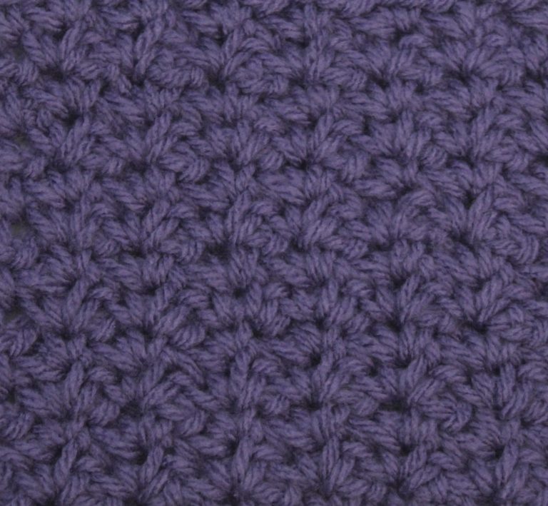 purple crocheted swatch of the spider stitch
