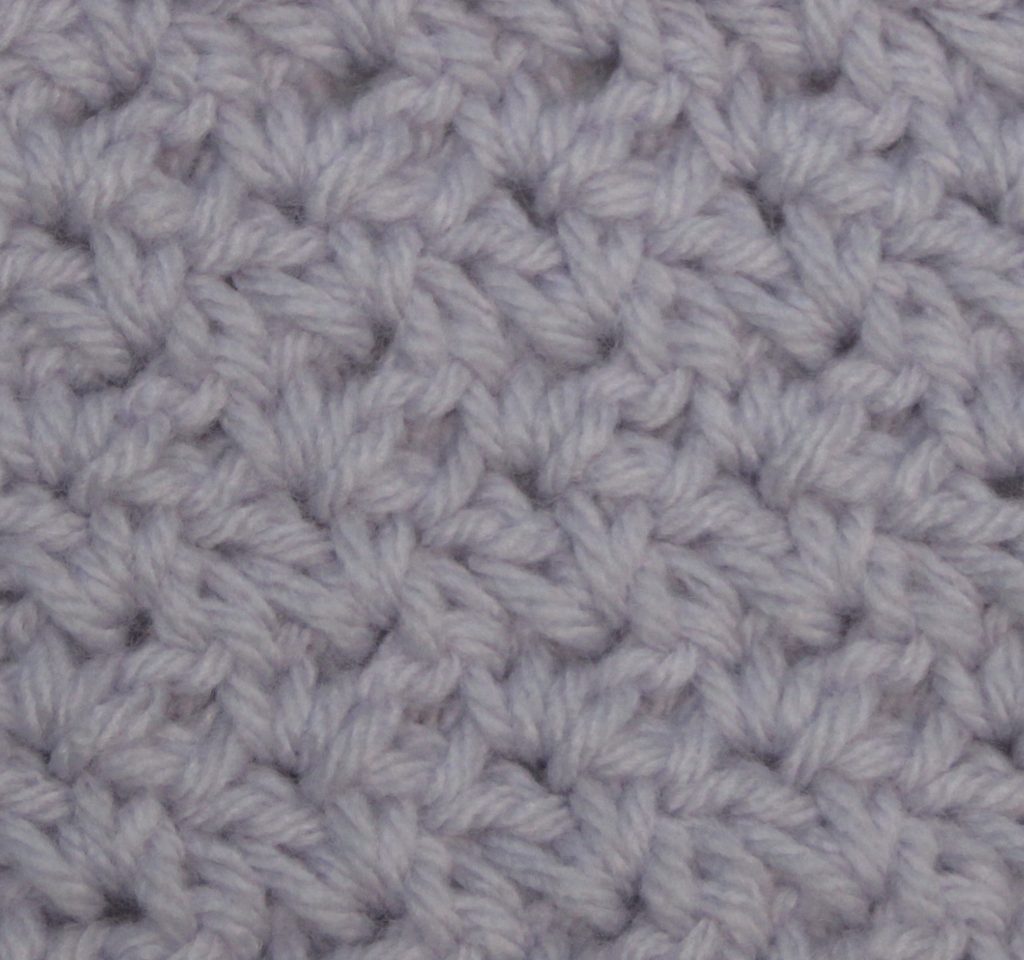 light purple crocheted swatch of the wattle stitch