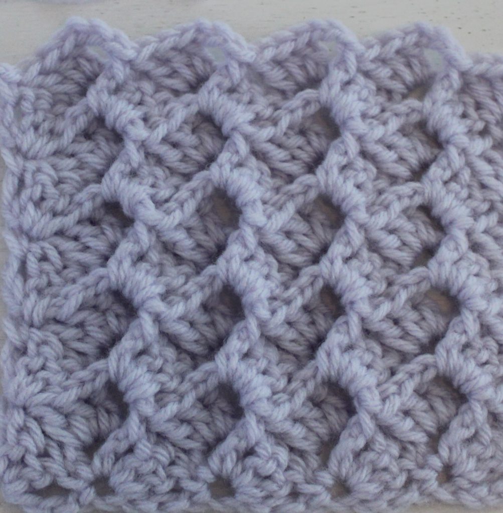 light purple crocheted swatch of the crystal waves stitch