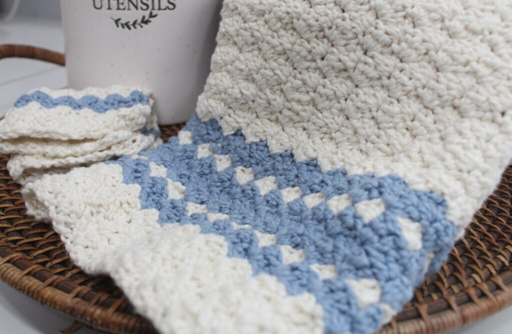 sedge stitch farmhouse tea towel set close up of blue and white striped tea towel 